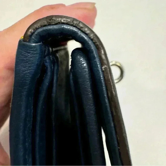 Navy blue pebble leather trifold wallet. Red interior. Perfect condition - Picture 6 of 10